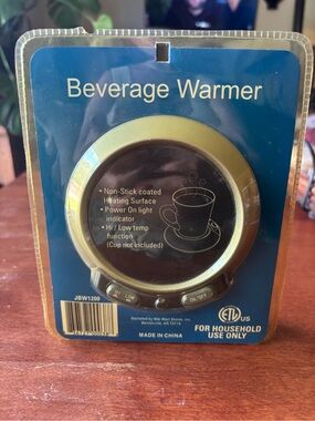 Walmart brand beverage warmer, model JBW1200, designed for tabletop use.